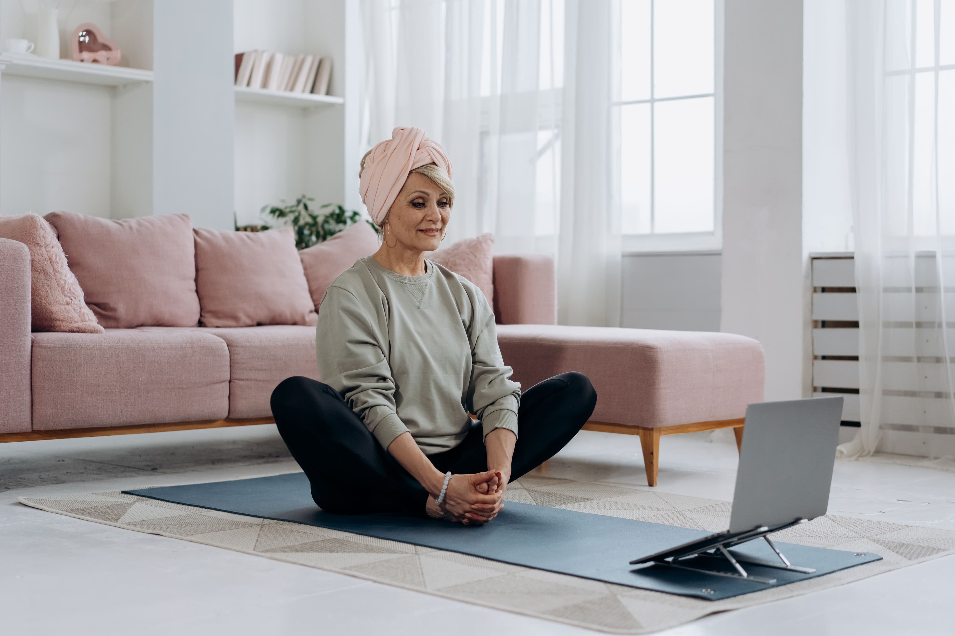 Person following an online wellness coaching session
